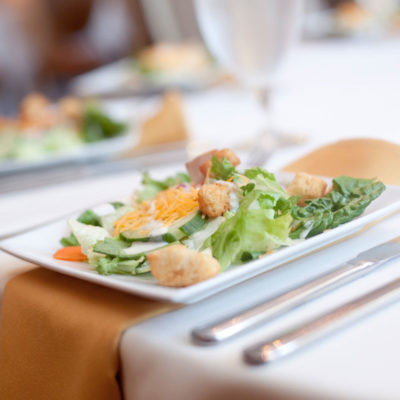 Plated salad at a wedding